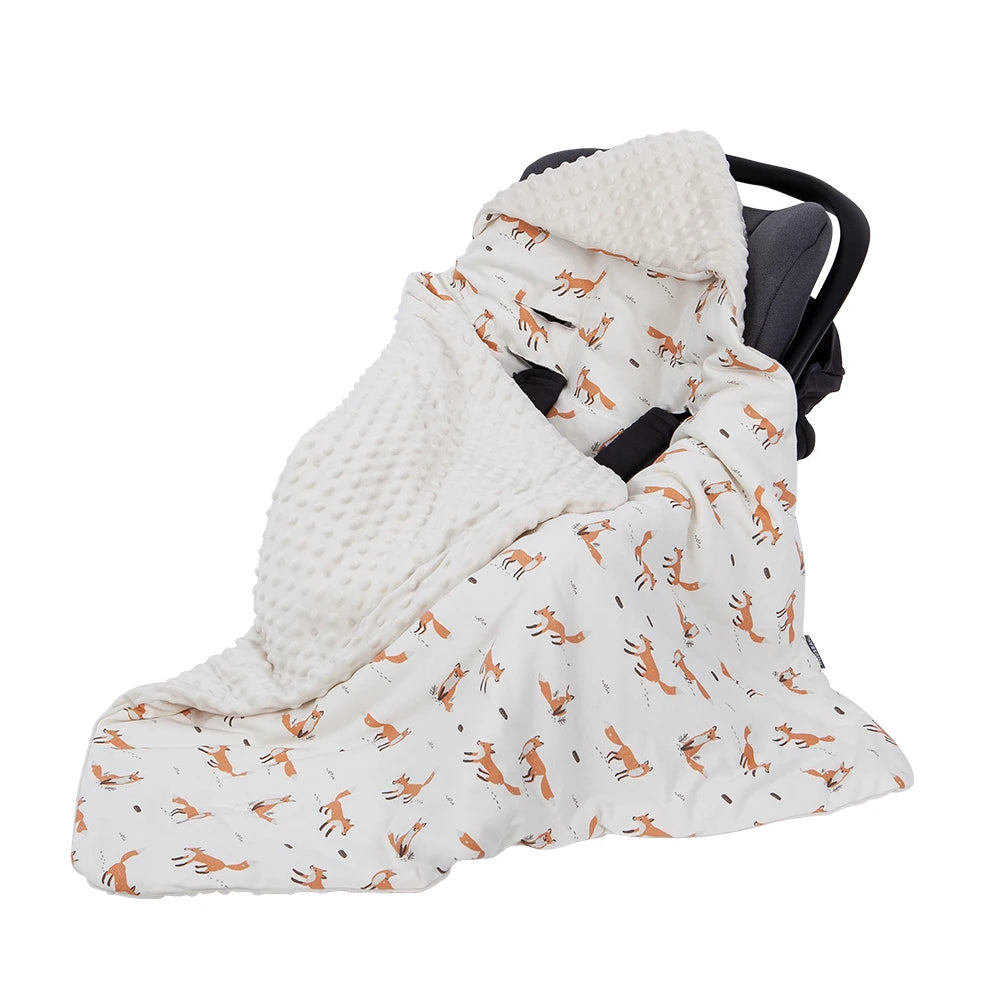 Couverture avec capuche coupe-vent à l'extérieur